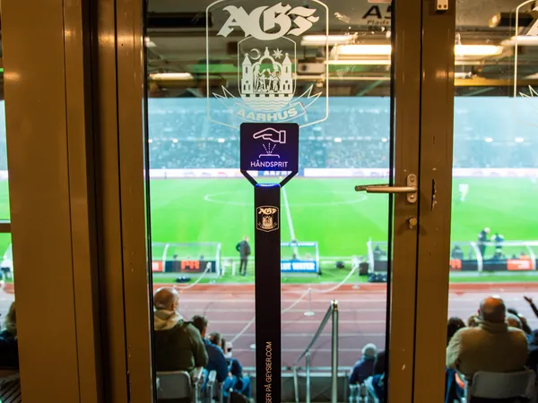 Geysier dispenser in the AGF lounge with the pitch behind the window