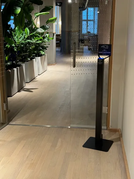 Black Geysier dispenser by the glass door to the ATP Ejendomme offices