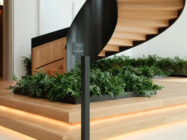 Geysier dispenser at the foot of the spiral staircase in the Selfinvest lobby