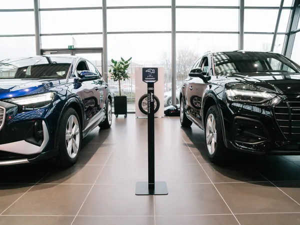 Geysier dispenser between two Audi cars in the Semler showroom